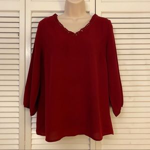 Red V-neck flowy blouse